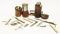 Lot 48 - Two matched (probably) leather cased travelling cutlery sets