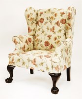 Lot 494 - A wing armchair