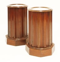 Lot 499 - A pair of mahogany cylindrical column pot cupboards