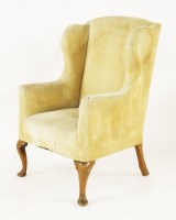 Lot 516 - A walnut wingback armchair