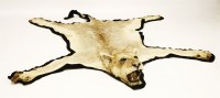Lot 233 - A lioness taxidermy rug