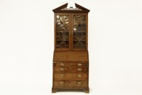 Lot 578 - A George III mahogany bureau bookcase