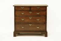 Lot 616 - A George III mahogany chest with two short and three long drawers