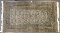 Lot 421 - A peach ground Persian rug