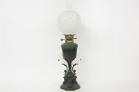 Lot 392A - A classical revival metal bodied oil lamp