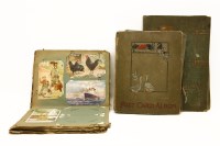 Lot 115 - Three postcard albums with over 400 postcards