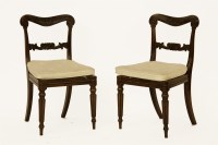 Lot 591 - A pair of Regency faux rosewood bar back single chairs