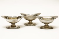 Lot 131 - A set of three silver navette shaped salts