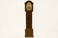 Lot 474 - An oak longcase clock