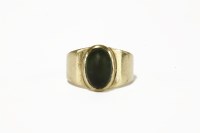 Lot 5 - A gold single stone tourmaline cabochon ring (tested as approximately 9ct) c.1960