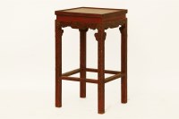 Lot 536 - A red lacquered Chinese table/stand