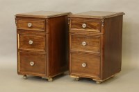 Lot 627 - A pair of walnut bedside tables