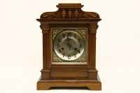 Lot 267 - An early 20th century walnut mantel clock
