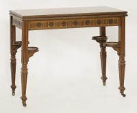 Lot 609 - A Victorian walnut fold-over card table