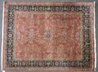 Lot 469 - A Persian-style red ground rug