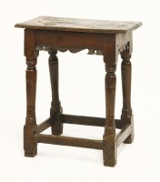 Lot 459 - An oak joined stool