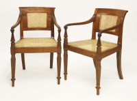 Lot 537 - A pair of colonial hardwood elbow chairs