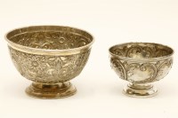 Lot 130 - Two early 20th century sugar bowls each decorated in relief with Rococo scrolls