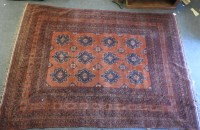 Lot 466 - A Turkoman style red ground carpet 350 x 250cm