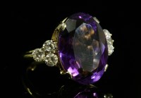 Lot 223 - An 18ct gold amethyst and diamond ring