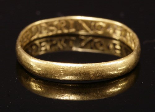 Lot 10 - A plain gold posy ring