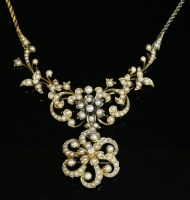 Lot 102 - A Victorian diamond and split pearl gold necklace