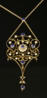 Lot 108 - An Edwardian sapphire and split pearl pendant