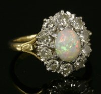 Lot 225 - An opal and diamond cluster ring