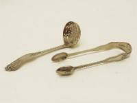 Lot 585 - A Victorian silver sugar sifter spoon and pair of sugar nips