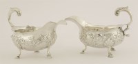 Lot 591 - A pair of George III silver sauce boats