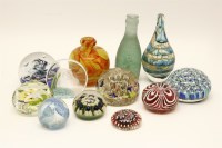 Lot 291 - A large collection of glass paperweights to include Caithness