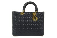 Lot 1077 - A Christian Dior 'Lady Dior' navy lambskin leather quilted handbag