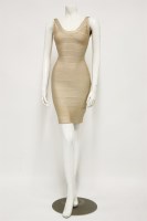 Lot 1344 - An Hervé Léger cream classic bandage dress