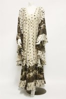 Lot 1245 - A 1970s cream cotton dress with brown geometric design