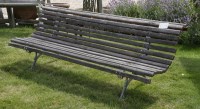 Lot 656 - A cast iron park bench