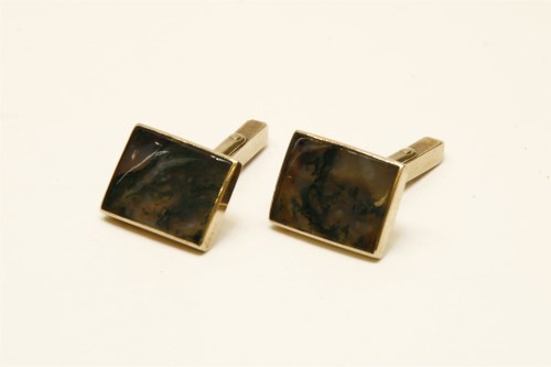 Lot 65 - A pair of 9ct gold rub set rectangular moss agate swivel cufflinks