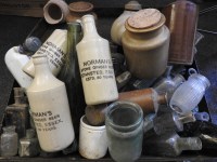 Lot 349 - A quantity of vintage glass and stoneware bottles