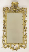 Lot 486 - A giltwood rococo mirror