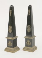 Lot 541 - A pair of Empire-style pottery obelisks