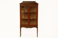 Lot 604 - An Edwardian inlaid mahogany display cabinet