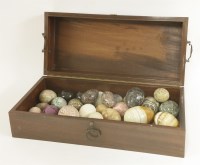 Lot 176 - A collection of hardstone carved eggs