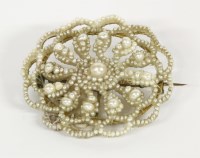 Lot 29 - A Victorian seed pearl and mother of pearl floral brooch