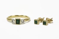Lot 3 - An 18ct gold emerald and diamond three stone ring