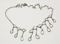 Lot 33 - A silver Edwardian moonstone necklace with moonstone fringe (one link missing)
7.04g