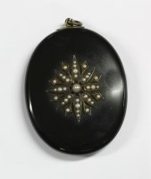 Lot 47 - A Victorian black onyx locket