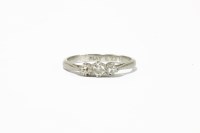 Lot 11 - A three stone diamond ring