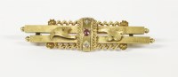 Lot 36 - A 15ct gold two row bar brooch set with ruby and diamond