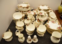 Lot 231 - A Royal Albert 'Old Country Roses' pattern six place tea