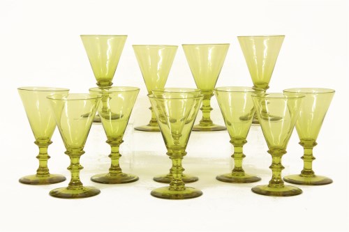 Lot 228 - A set of twelve yellow wine glasses
