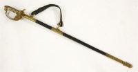 Lot 357 - A Royal Navy Officer's sword and scabbard with shagreen grip and brass lion pommel. 99cm long